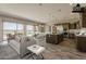 Open-concept living space featuring a modern kitchen, dining area, and comfortable living area at 36172 N Secret Garden Path, Queen Creek, AZ 85140