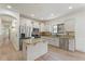 Contemporary kitchen with white cabinets, granite countertops, and stainless steel appliances at 4278 E Del Rio Dr, San Tan Valley, AZ 85140