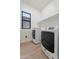 Convenient laundry room equipped with a washer, dryer, and storage space at 4278 E Del Rio Dr, San Tan Valley, AZ 85140