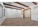Spacious living room with exposed wood beams, neutral walls, and light wood flooring at 4278 E Del Rio Dr, San Tan Valley, AZ 85140