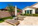 This backyard has multiple lounge chairs that are perfect for relaxing in the sun at 4332 S Oregon Ct, Chandler, AZ 85248