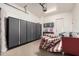 Garage with custom cabinets, overhead storage, and ample space for vehicles at 4332 S Oregon Ct, Chandler, AZ 85248