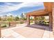 Community outdoor kitchen with a covered area, perfect for gatherings near the pond at 4332 S Oregon Ct, Chandler, AZ 85248