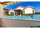 Enjoy this refreshing pool with a covered patio, perfect for escaping the summer heat at 4332 S Oregon Ct, Chandler, AZ 85248