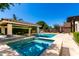Resort style pool with spa, tanning shelf and swim up bar covered by a ramada at 4332 S Oregon Ct, Chandler, AZ 85248
