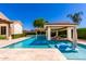 Inviting pool with a swim-up bar, cabana, and tanning ledge for relaxing at 4332 S Oregon Ct, Chandler, AZ 85248