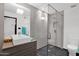 Modern bathroom with an undermount sink and a frameless glass shower enclosure at 4800 N 68Th St # 101, Scottsdale, AZ 85251