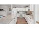 Bright kitchen featuring white cabinets and modern appliances at 4837 E Whitehall Dr, San Tan Valley, AZ 85140