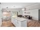 Open concept living area featuring kitchen, living, and dining spaces at 4837 E Whitehall Dr, San Tan Valley, AZ 85140