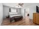 Relaxing main bedroom with neutral tones and an en-suite bathroom at 4837 E Whitehall Dr, San Tan Valley, AZ 85140