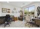 Bright home office featuring two desks and a comfortable armchair, perfect for productivity at 5100 E Rancho Paloma Dr # 1029, Cave Creek, AZ 85331