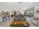 Spacious living room showcasing the layout with kitchen view and expansive sliding glass doors at 5100 E Rancho Paloma Dr # 1029, Cave Creek, AZ 85331