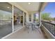 Cozy patio with outdoor seating, sliding glass doors, and a view of the desert landscape at 5100 E Rancho Paloma Dr # 1029, Cave Creek, AZ 85331