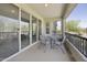 Outdoor patio with seating and a view of the surrounding trees and desert landscape at 5100 E Rancho Paloma Dr # 1029, Cave Creek, AZ 85331
