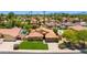 Aerial view of a home featuring a large front yard, private pool, and desert landscaping at 5507 E Kings Ave, Scottsdale, AZ 85254