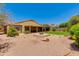Wide backyard featuring desert landscaping, patio and a covered deck at 5507 E Kings Ave, Scottsdale, AZ 85254