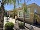 A lush backyard view showcases a charming patio, desert landscaping, and a well-maintained property at 562 E Vesper Trl, Queen Creek, AZ 85140
