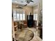 Cozy bar room with cooler, round area rug, and seating at 562 E Vesper Trl, Queen Creek, AZ 85140