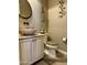Elegant powder room with unique vessel sink and decorative toilet seat at 562 E Vesper Trl, Queen Creek, AZ 85140
