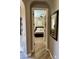 Inviting bedroom view showcases a cozy bed and light-filled space through a doorway at 562 E Vesper Trl, Queen Creek, AZ 85140