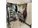 Walk in closet with lots of storage space and shelving in organized condition at 562 E Vesper Trl, Queen Creek, AZ 85140