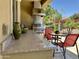 A spacious outdoor kitchen with grill, ample counter space, and backyard views at 562 E Vesper Trl, Queen Creek, AZ 85140