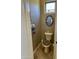 Powder room with decorative mirror and towel rack at 562 E Vesper Trl, Queen Creek, AZ 85140
