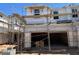 View of exterior of new construction showing garage, windows, and siding at 5843 E Covey Ln, Phoenix, AZ 85054