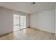 Bedroom featuring tile floor, sliding glass door to the exterior, and recessed lighting at 662 W Elena Ave, Mesa, AZ 85210