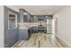 Beautifully remodeled kitchen with custom blue-gray cabinets and stainless steel appliances at 662 W Elena Ave, Mesa, AZ 85210