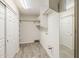 Well-lit laundry room with washer and dryer hookups and ample storage space at 662 W Elena Ave, Mesa, AZ 85210