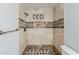 Modern shower with tile accents and a convenient shower head at 662 W Elena Ave, Mesa, AZ 85210