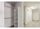 View of a walk-in closet with built in shelving and open access to hallway at 662 W Elena Ave, Mesa, AZ 85210