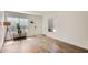Bright living room features wood floors, contemporary decor, and ample natural light at 700 E Mesquite Cir # J135, Tempe, AZ 85288