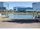 Scenic waterfront view with modern office buildings in the background at 700 E Mesquite Cir # J135, Tempe, AZ 85288