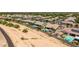 A high-angle shot of a residential neighborhood with a pool and landscaped yards at 7002 S Portland Ave, Gilbert, AZ 85298