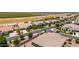 Aerial view capturing the serene neighborhood with well-kept lawns, mature trees and charming homes at 7002 S Portland Ave, Gilbert, AZ 85298