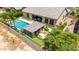 Aerial view showcasing a backyard pool, kitchen, fire pit, and golf green at 7002 S Portland Ave, Gilbert, AZ 85298