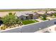 Aerial view of a single-story home showcasing the desert landscaping, stone accents, and tiled roof at 7002 S Portland Ave, Gilbert, AZ 85298
