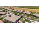 Stunning aerial view of a residential neighborhood showcasing lush green spaces and well-maintained homes at 7002 S Portland Ave, Gilbert, AZ 85298