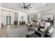 Spacious open living area with neutral decor and a comfortable seating arrangement at 7002 S Portland Ave, Gilbert, AZ 85298