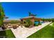 Relaxing covered outdoor area with comfortable seating and views of the pool at 7002 S Portland Ave, Gilbert, AZ 85298