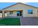 Backyard includes low-maintenance landscaping, covered patio, and access to indoor living space at 7321 N 123Rd Dr, Glendale, AZ 85307