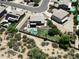 Aerial view of a two-story home with a pool, grassy yard, and desert landscaping at 7398 W Paso Trl, Peoria, AZ 85383
