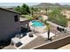 View of a backyard pool with desert views, built in grill, and lots of space for entertaining at 7398 W Paso Trl, Peoria, AZ 85383