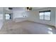 Upstairs living room with a ceiling fan, a large window, and a view of the surrounding area at 7398 W Paso Trl, Peoria, AZ 85383