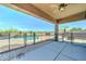 View of backyard with covered patio and gated pool at 7398 W Paso Trl, Peoria, AZ 85383