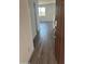 Welcoming entryway featuring wood-look tile flooring leading into the living space at 804 W Lark Dr, Queen Creek, AZ 85140