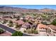 Aerial shot of upscale homes, desert landscaping, and mountain views at 818 E Hiddenview Dr, Phoenix, AZ 85048