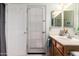 This bathroom features a single sink vanity and access to an outside area at 818 E Hiddenview Dr, Phoenix, AZ 85048